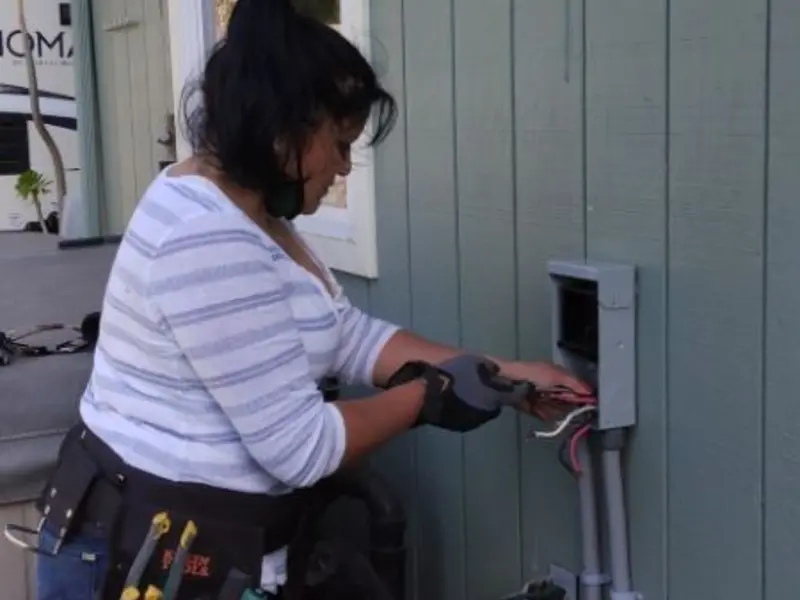 Licensed electrician wiring an exterior subpanel in Chehalis